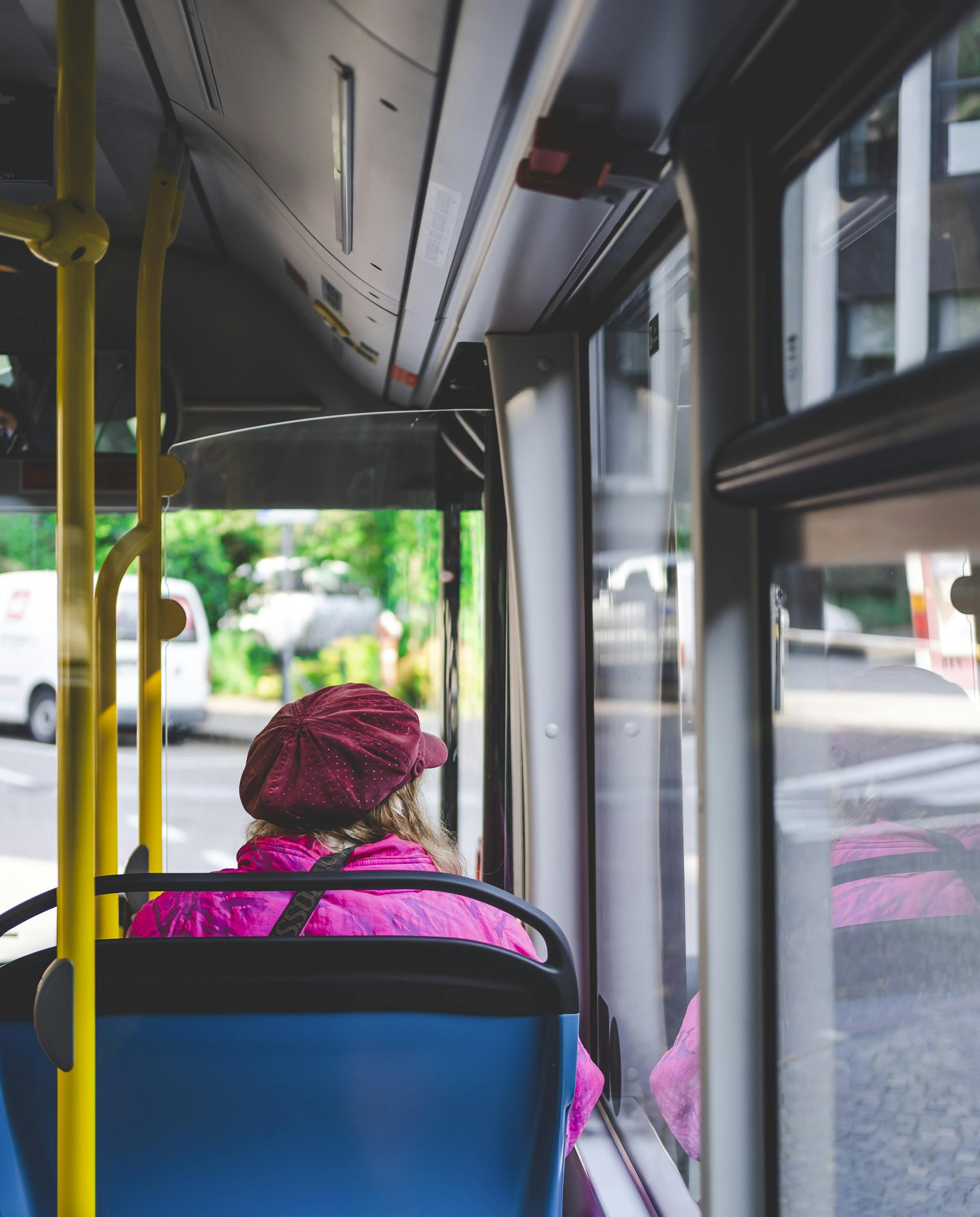 Woman Sitting Inside Bus